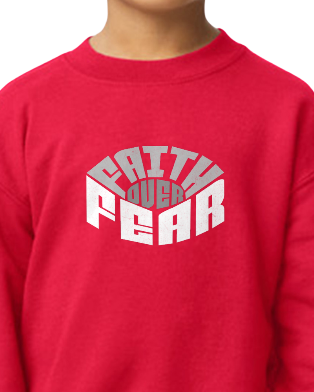 Red sweatshirt with 'Faith Over Fear' text worn by a person