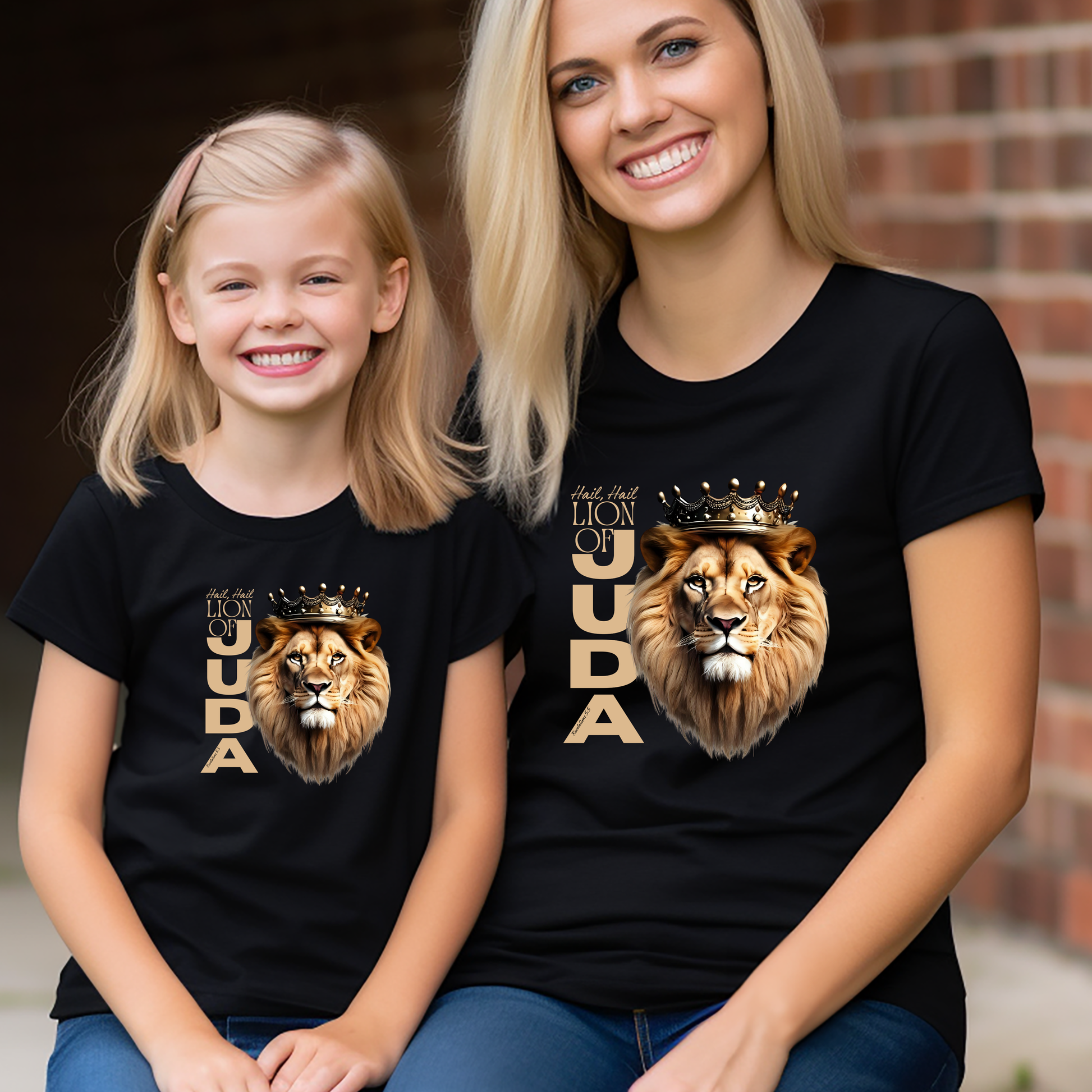 Woman and child wearing black t-shirts with a lion graphic and 'Hail, Hail Lion of Judah' text.