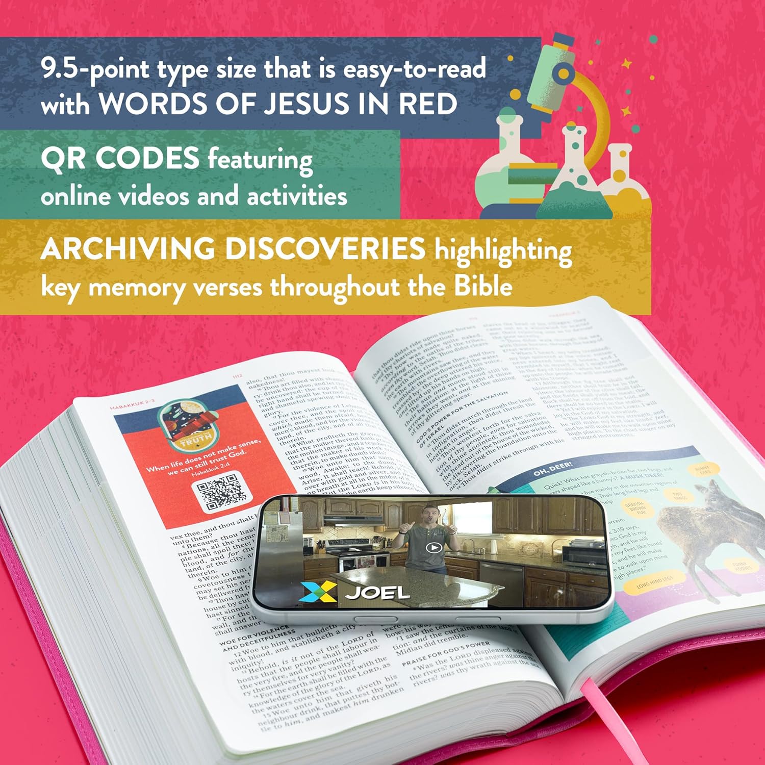 KJV Explorer Bible for Kids – Bubble Gum LeatherTouch (Full-Color Study Edition). Open Bible with smartphone displaying a video, on a pink background