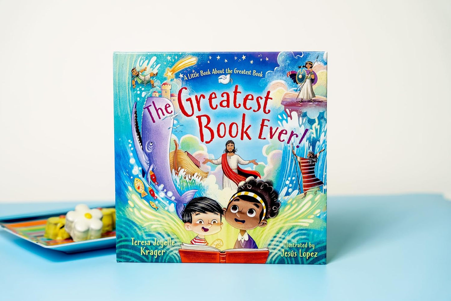 The Greatest Book Ever – Children’s Bible Storybook Hardcover | Ages 4–8. Children's book titled 'The Greatest Book Ever!' on a blue surface with a white background