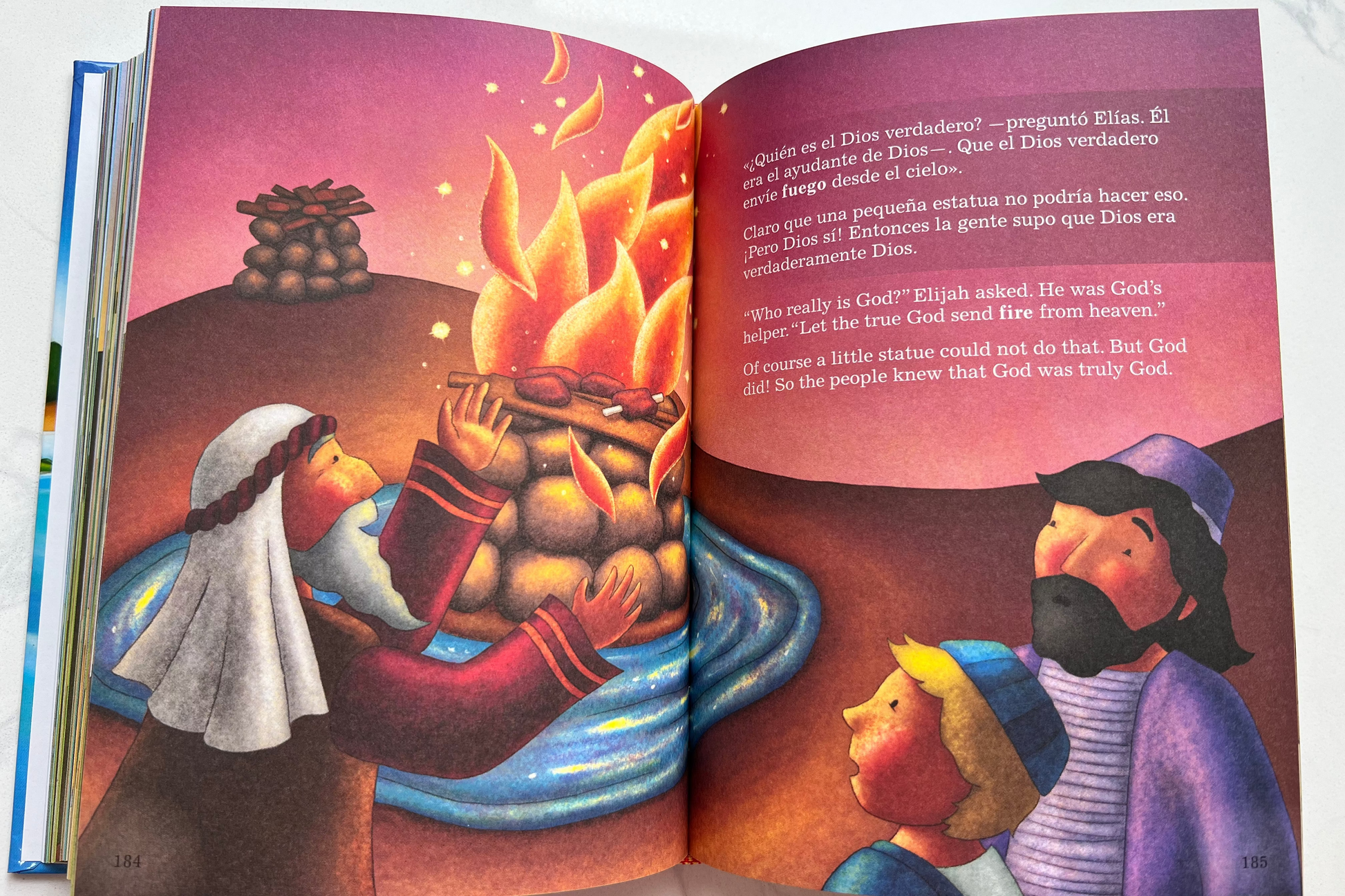 Interior pages of La Biblia de los Pequeñitos – The Toddler's Bible Bilingual Spanish and English with colorful illustrated Bible stories for toddlers ages 2–5