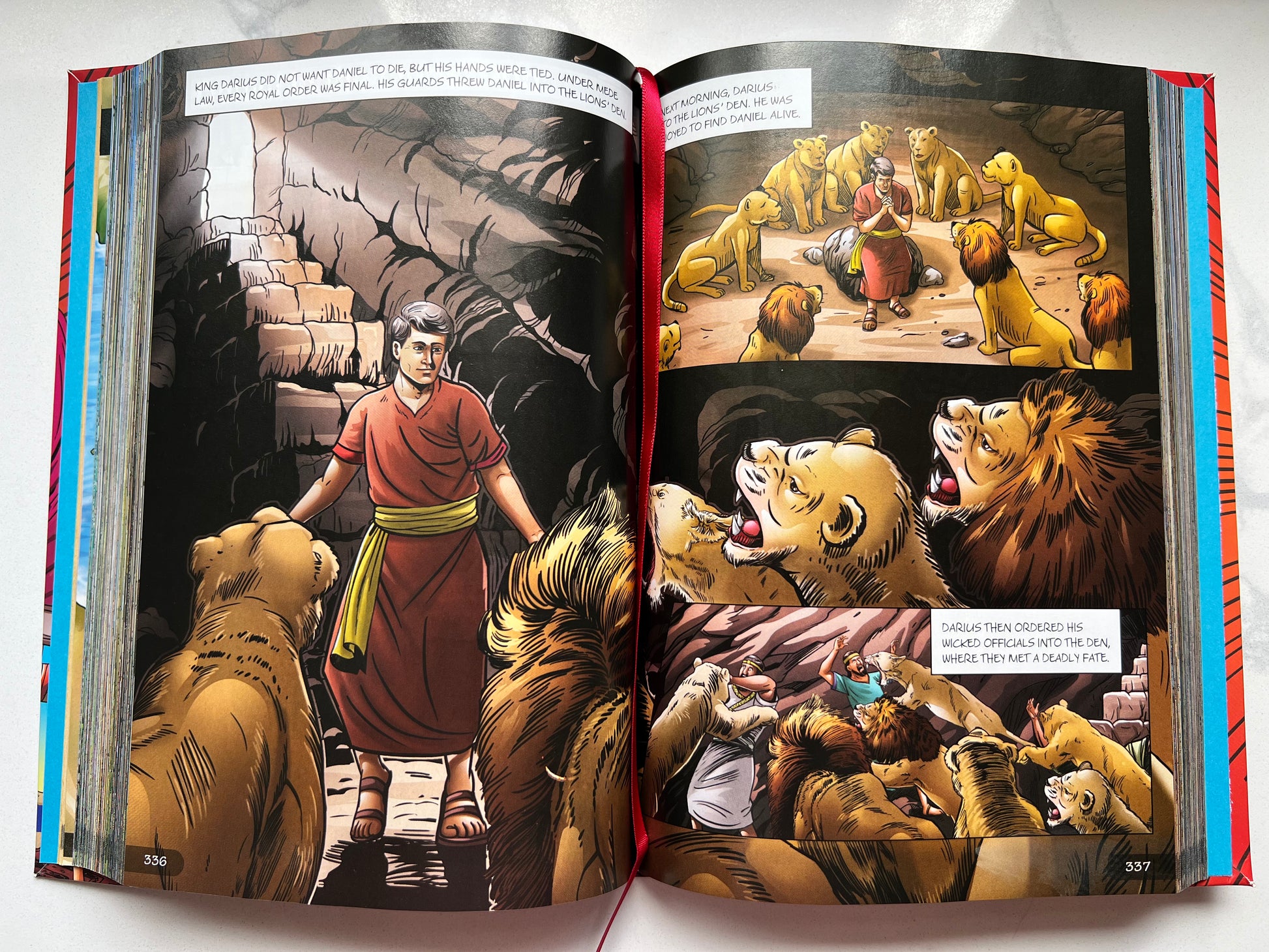 Interior spread of BibleForce: The First Heroes Bible – illustrated comic panel of Daniel in the lions' den – Christian graphic novel Bible for kids ages 7–12