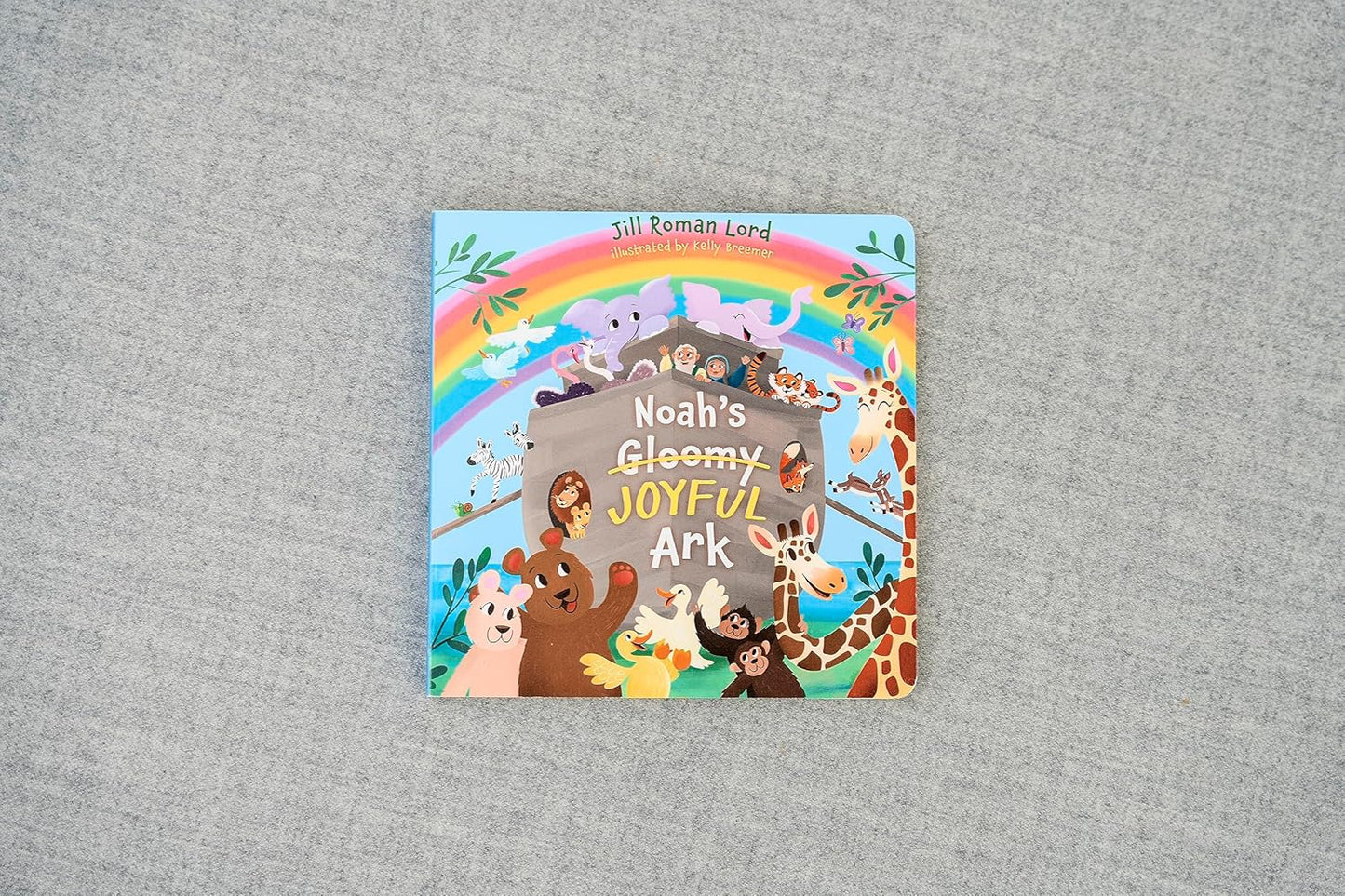 Noah’s Gloomy Joyful Ark – Little Bible Heroes Board Book #8 | Bible Story of Faith, Joy & God’s Promise for Kids. Cover Book in gray background.